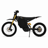A black SB Storm electric dirt bike with gold suspension forks and rear shock, featuring knobby tires and a kickstand, shown from a side profile on a white background.